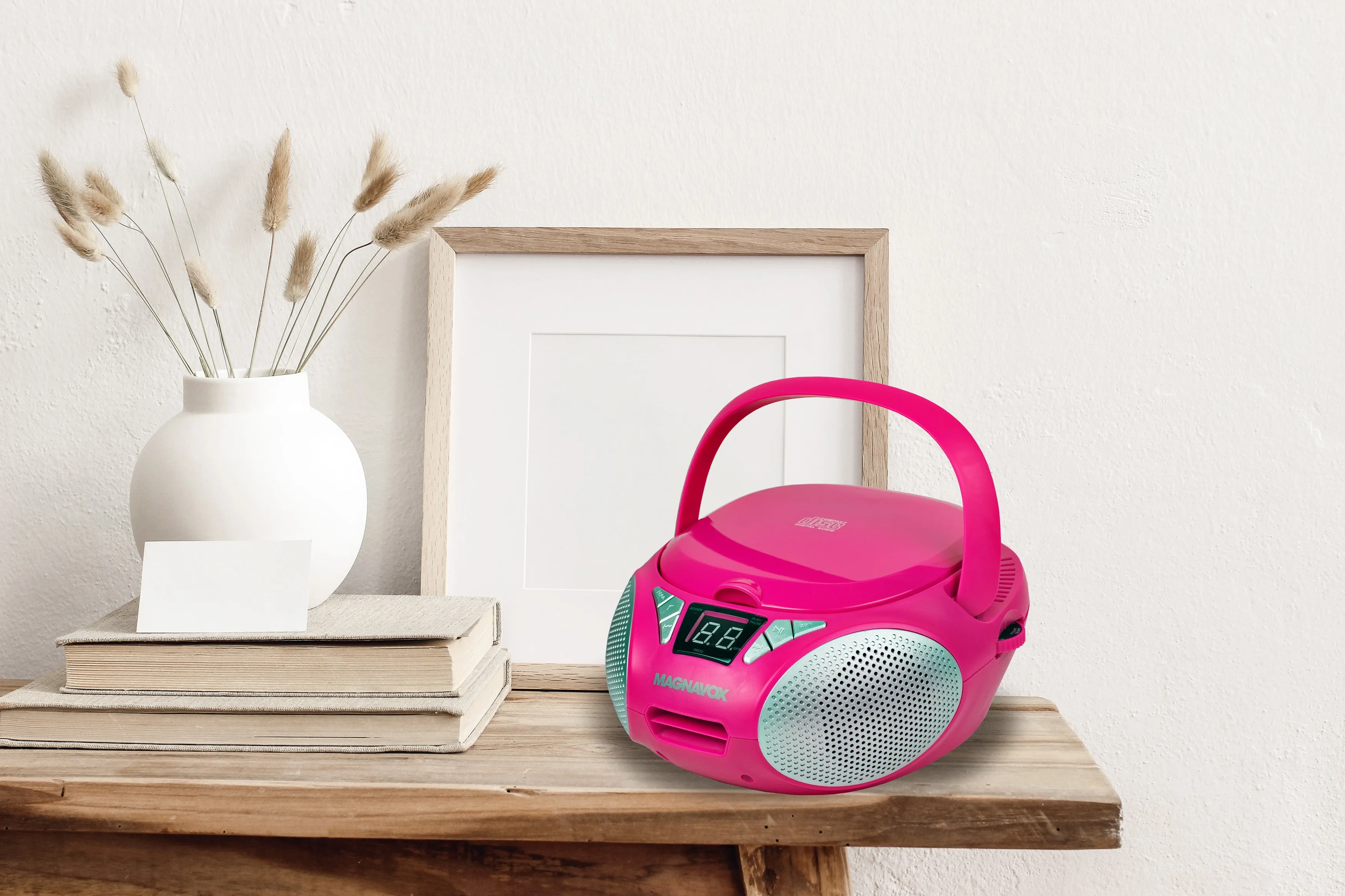 Magnavox MD6924-PK Portable Top Loading CD Boombox with AM/FM Stereo Radio in Pink