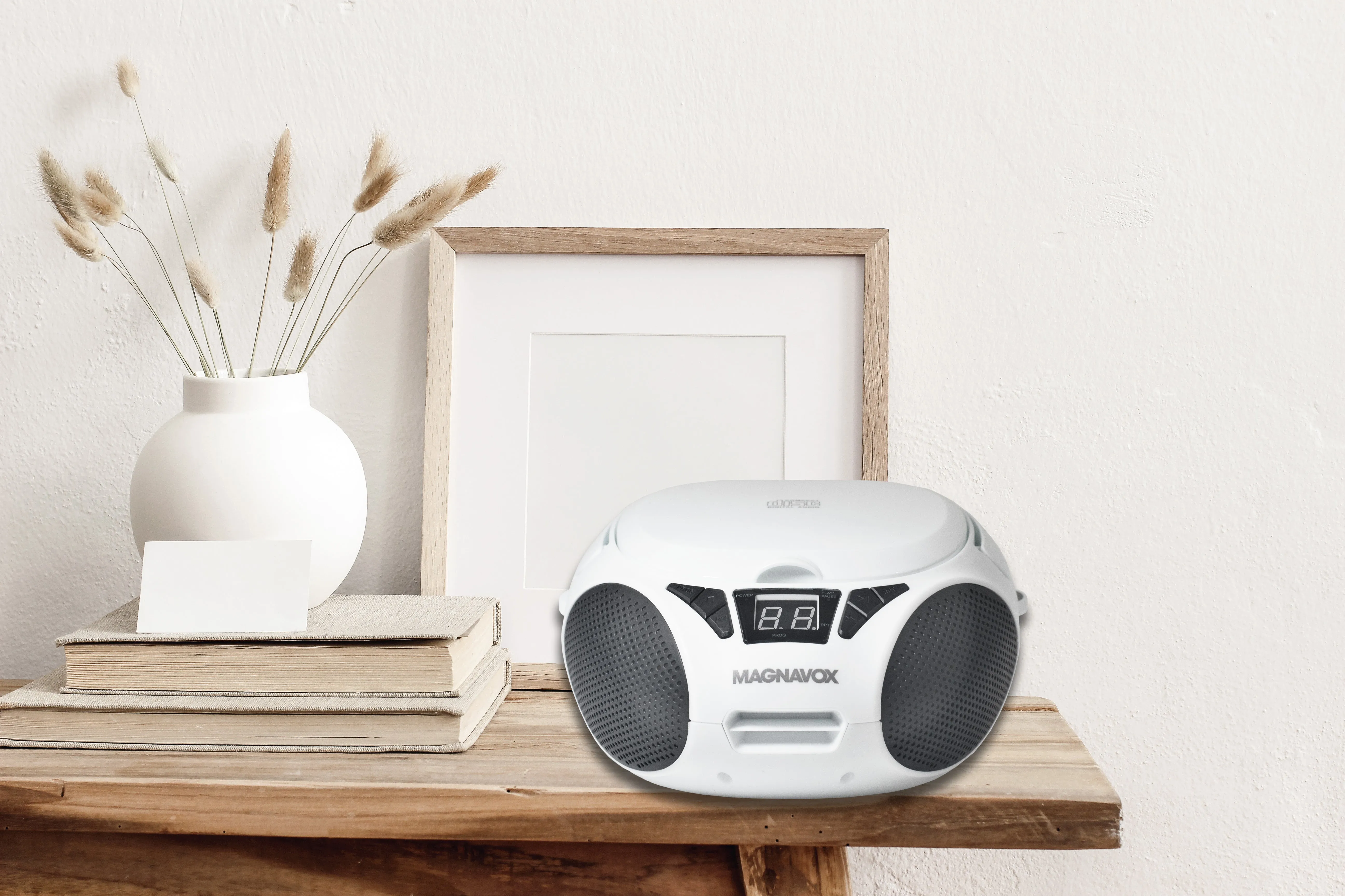 Magnavox MD6924-WH Portable Top Loading CD Boombox with AM/FM Radio in White/Black